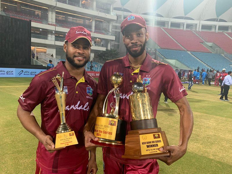 Roston and Shai with their awards.jpg