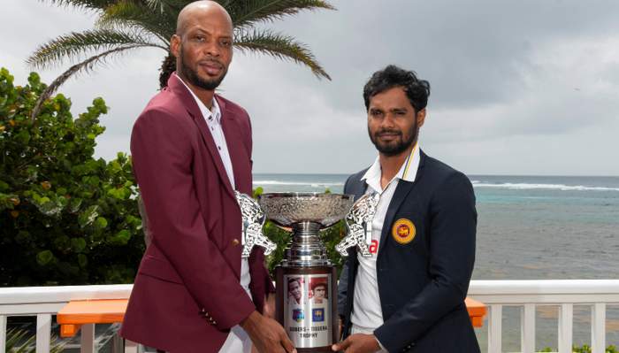 Holding Trophy Captains (1)